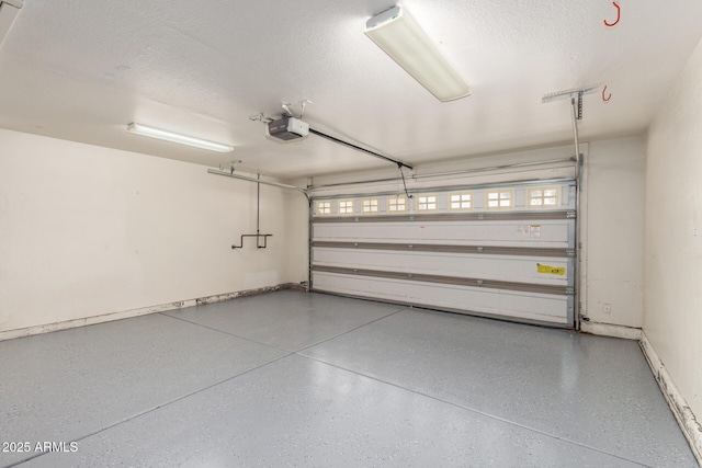 1114 N Leland Ct, Gilbert, AZ 85233 - garage with a garage door opener and baseboards