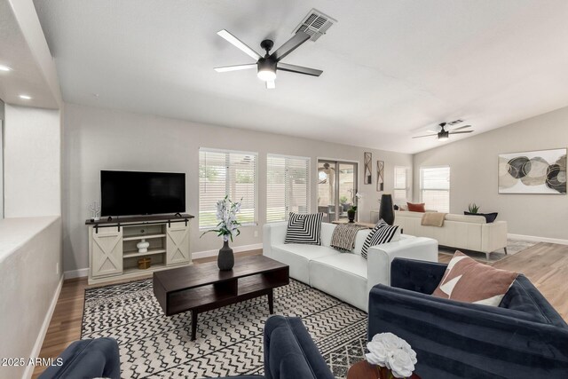 1114 N Leland Ct, Gilbert, AZ 85233 - living area with ceiling fan, baseboards, and healthy amount of natural light