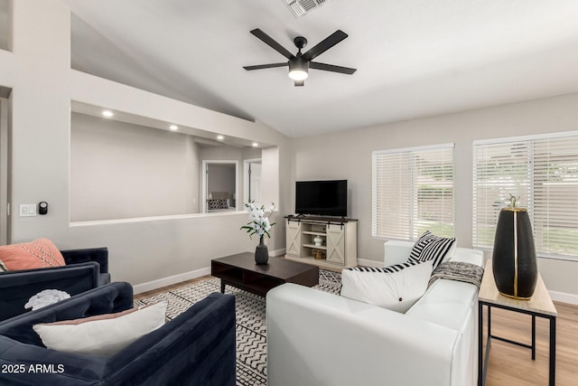 1114 N Leland Ct, Gilbert, AZ 85233 - living room featuring a ceiling fan, wood finished floors, baseboards, vaulted ceiling, and recessed lighting