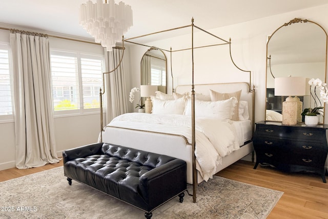 bedroom featuring wood finished floors