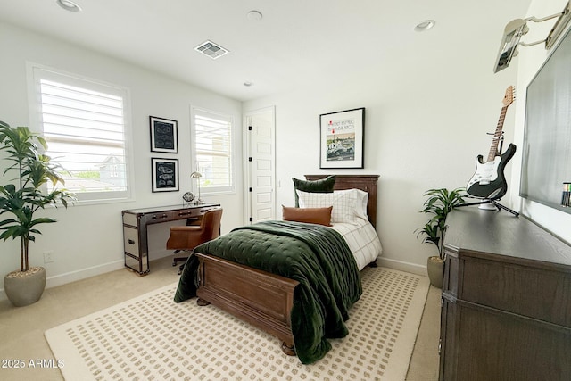 bedroom featuring baseboards, light colored carpet, and recessed lighting