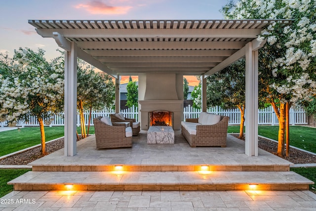 view of patio / terrace featuring an outdoor living space with a fireplace