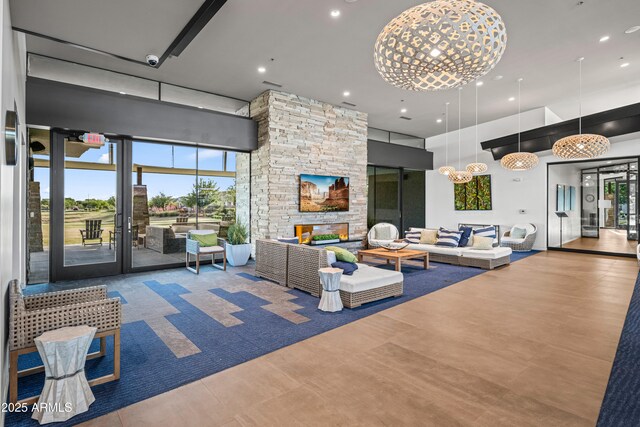 lobby with a high ceiling and recessed lighting