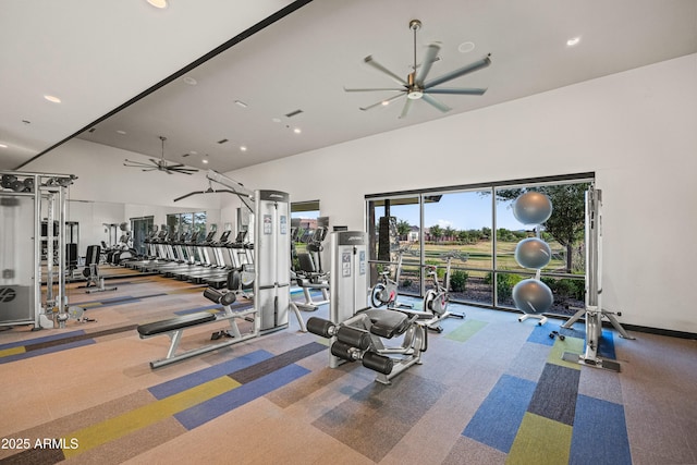 workout area featuring a ceiling fan, carpet floors, a high ceiling, and recessed lighting
