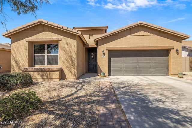 ranch-style home with stucco siding, driveway, and an attached garage