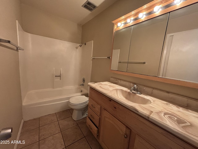 7126 N 19th Ave Unit 108, Phoenix, AZ 85021 - full bath featuring vanity, tile patterned flooring, toilet, and shower / washtub combination