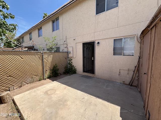 7126 N 19th Ave Unit 108, Phoenix, AZ 85021 - back of property with stucco siding and a patio area