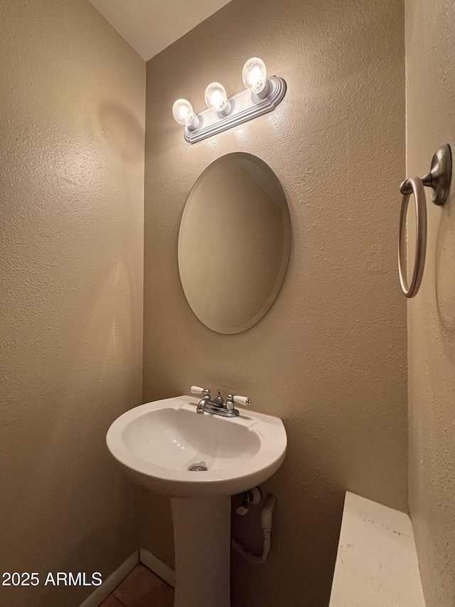 7126 N 19th Ave Unit 108, Phoenix, AZ 85021 - bathroom with tile patterned floors and a sink