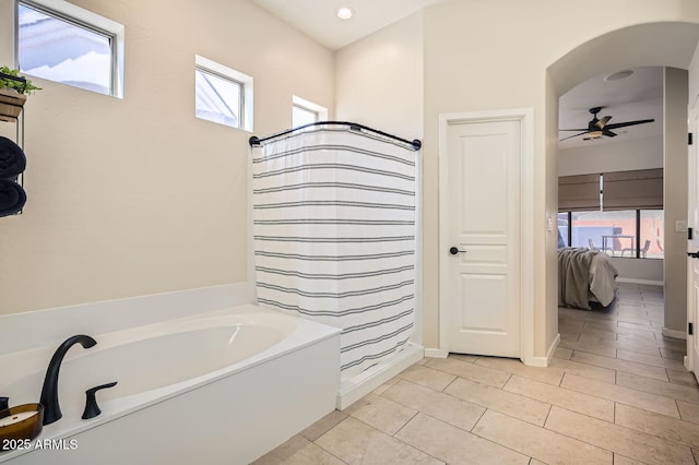 bathroom with a bath, ceiling fan, connected bathroom, and a shower with shower curtain