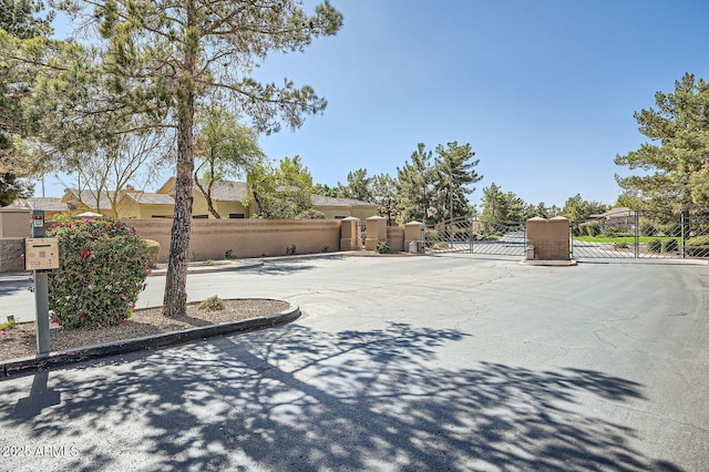 view of yard featuring a gate and fence