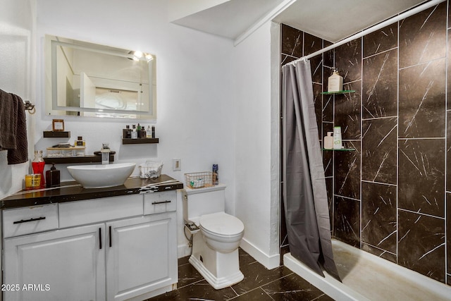 bathroom featuring walk in shower, vanity, and toilet