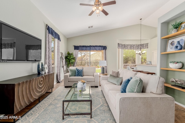 3055 N Red Mtn Unit 77, Mesa, AZ 85207 - living room with a chandelier, lofted ceiling, a ceiling fan, and wood finished floors