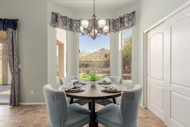 3055 N Red Mtn Unit 77, Mesa, AZ 85207 - dining area with a chandelier and baseboards
