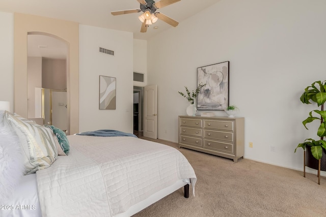 3055 N Red Mtn Unit 77, Mesa, AZ 85207 - bedroom featuring arched walkways, light carpet, high vaulted ceiling, and ceiling fan