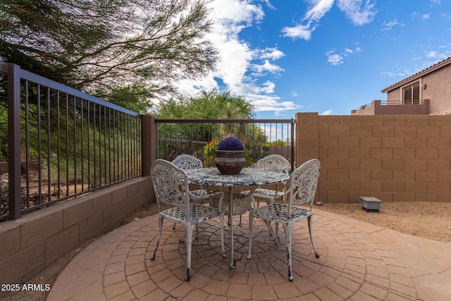 3055 N Red Mtn Unit 77, Mesa, AZ 85207 - view of patio / terrace featuring outdoor dining area