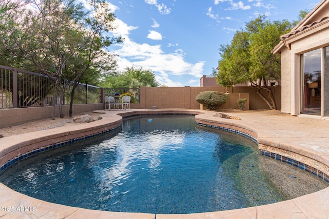3055 N Red Mtn Unit 77, Mesa, AZ 85207 - view of swimming pool featuring a fenced backyard and a patio