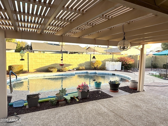 view of swimming pool with a pergola and a patio area