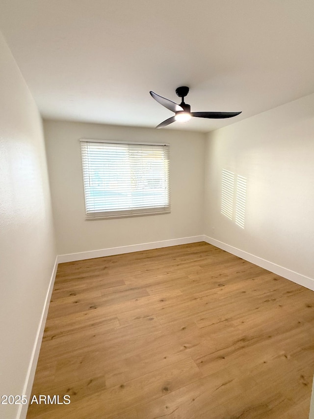 unfurnished room with ceiling fan and light hardwood / wood-style floors