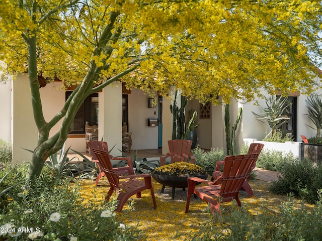 view of patio featuring a fire pit