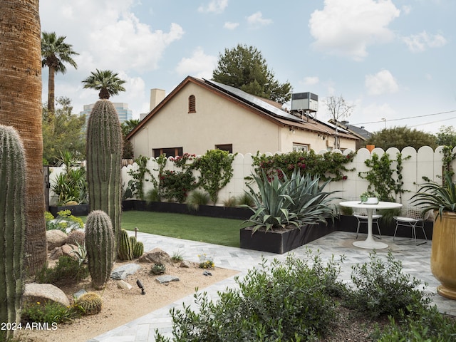 view of yard with cooling unit and a patio area