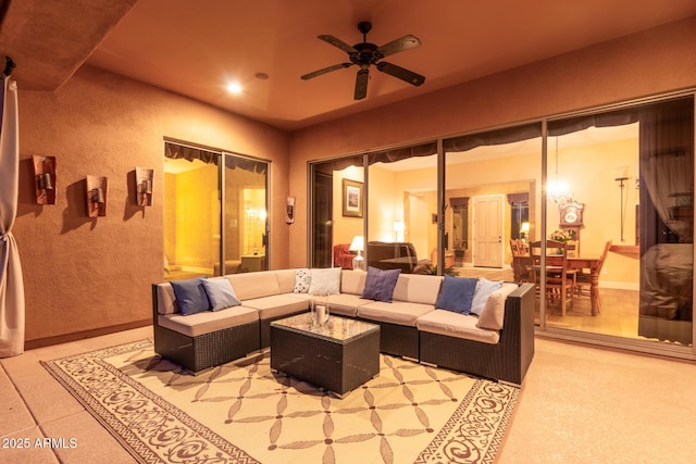 living room with ceiling fan