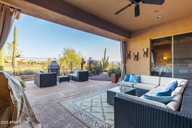 view of patio / terrace featuring an outdoor living space and ceiling fan