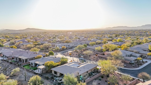 aerial view at dusk with a mountain view