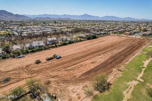 bird's eye view with a residential view and a mountain view