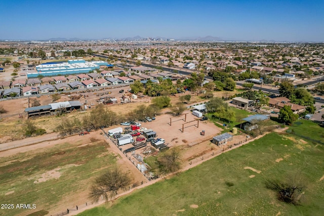 birds eye view of property with a residential view