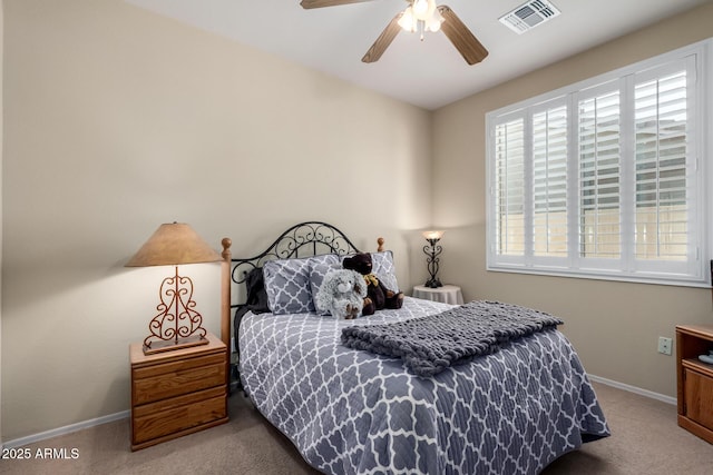 bedroom with a ceiling fan, baseboards, visible vents, and carpet floors