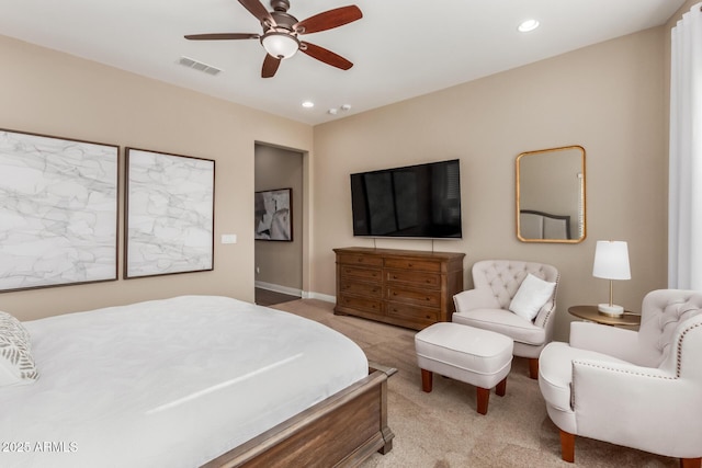 carpeted bedroom featuring ceiling fan