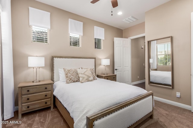 carpeted bedroom featuring ceiling fan