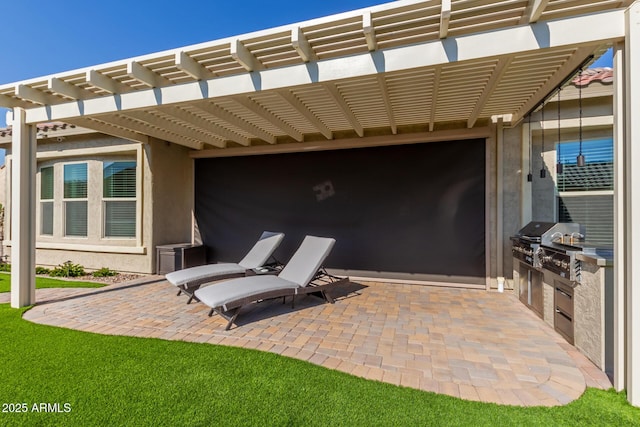 view of patio featuring area for grilling, a grill, and a pergola