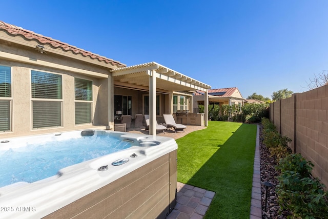 rear view of house featuring a pergola, a yard, a patio area, and a hot tub