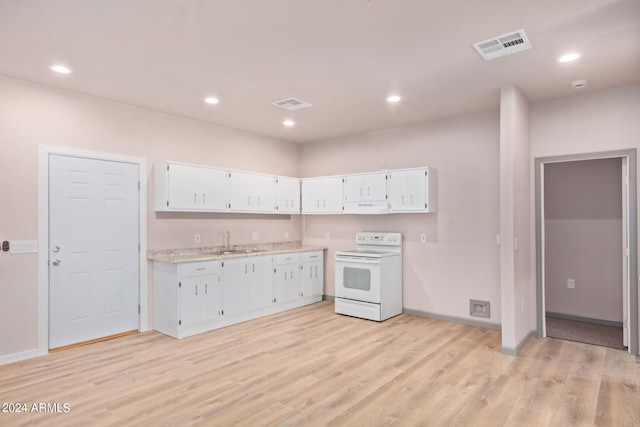 kitchen with light hardwood / wood-style floors, electric range, extractor fan, white cabinets, and sink