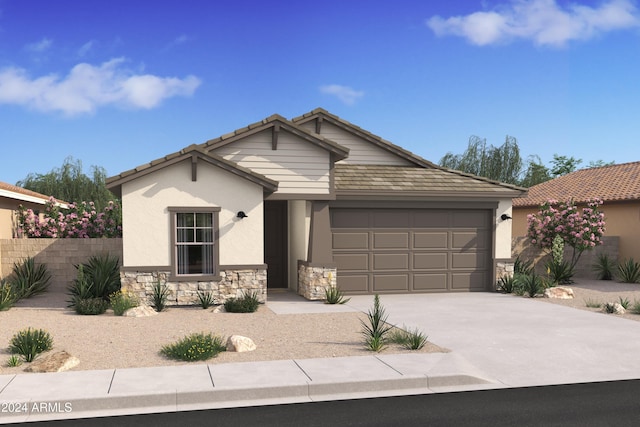 view of front of property with a garage