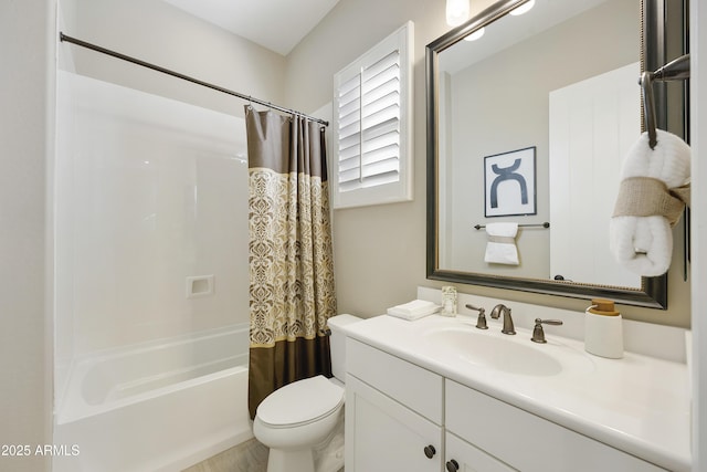 full bathroom featuring vanity, toilet, and shower / bath combo with shower curtain