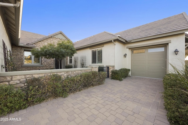 view of front of home with a garage