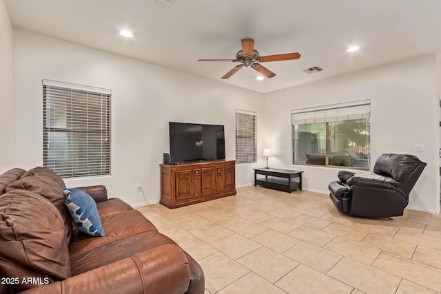 9009 S 57th Dr, Laveen, AZ 85339 - living room featuring a ceiling fan, light tile patterned floors, baseboards, and recessed lighting