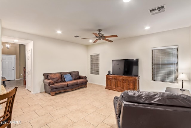 9009 S 57th Dr, Laveen, AZ 85339 - living room with baseboards, visible vents, ceiling fan, and recessed lighting