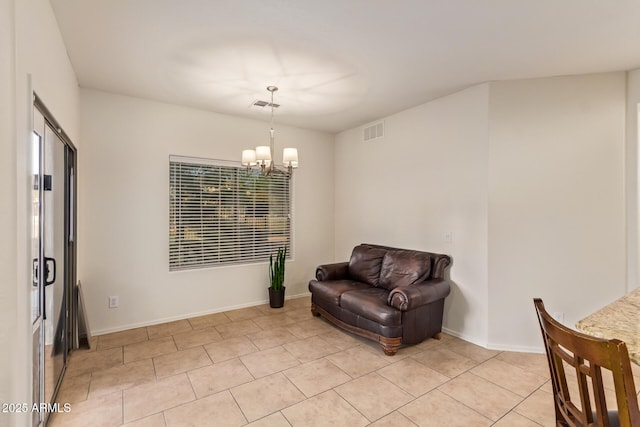 9009 S 57th Dr, Laveen, AZ 85339 - living area featuring baseboards, visible vents, and a notable chandelier