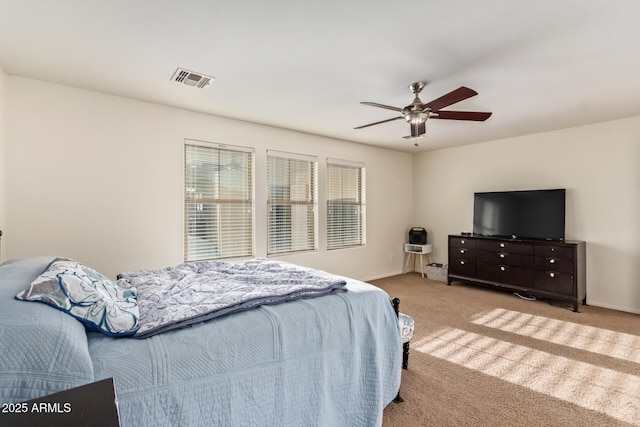 9009 S 57th Dr, Laveen, AZ 85339 - bedroom featuring baseboards, carpet floors, ceiling fan, and visible vents