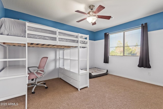 9009 S 57th Dr, Laveen, AZ 85339 - unfurnished bedroom featuring baseboards, carpet flooring, and a ceiling fan