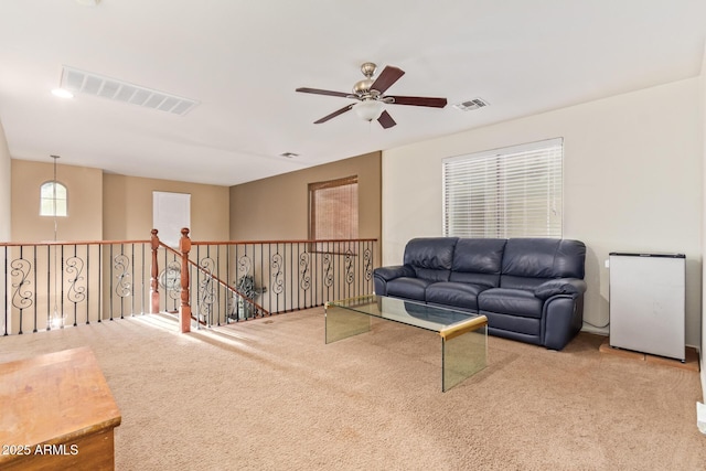 9009 S 57th Dr, Laveen, AZ 85339 - living area featuring carpet flooring, visible vents, and a ceiling fan