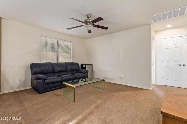 9009 S 57th Dr, Laveen, AZ 85339 - carpeted living area with baseboards, visible vents, and a ceiling fan