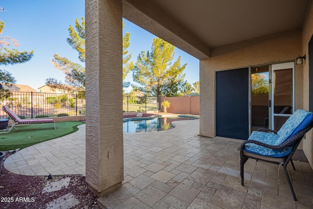 9009 S 57th Dr, Laveen, AZ 85339 - view of patio featuring a fenced backyard and a fenced in pool