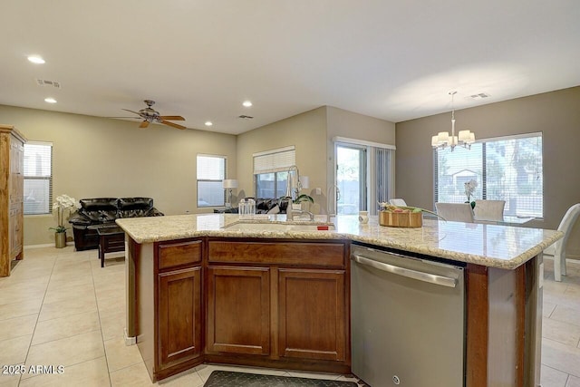 9009 S 57th Dr, Laveen, AZ 85339 - kitchen with light tile patterned flooring, open floor plan, visible vents, and dishwasher