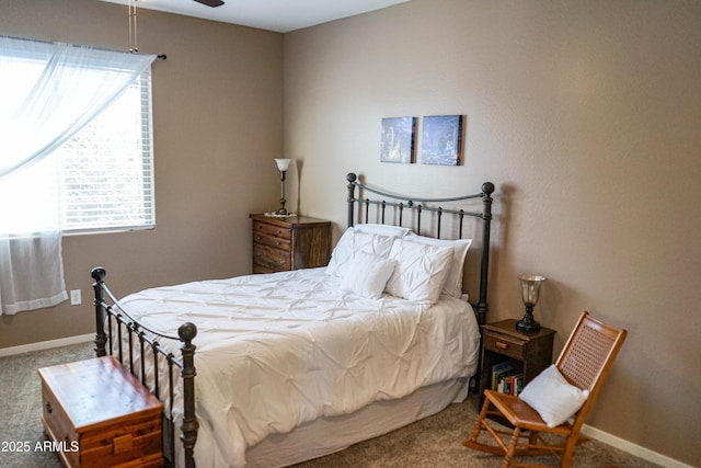 bedroom with baseboards and carpet flooring