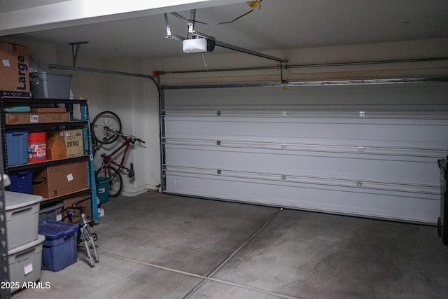 garage featuring a garage door opener