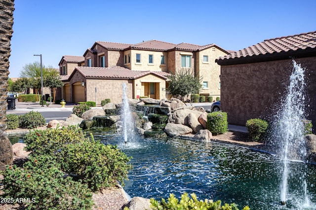 view of property's community featuring driveway